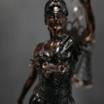 close up photo of lady justice statuette